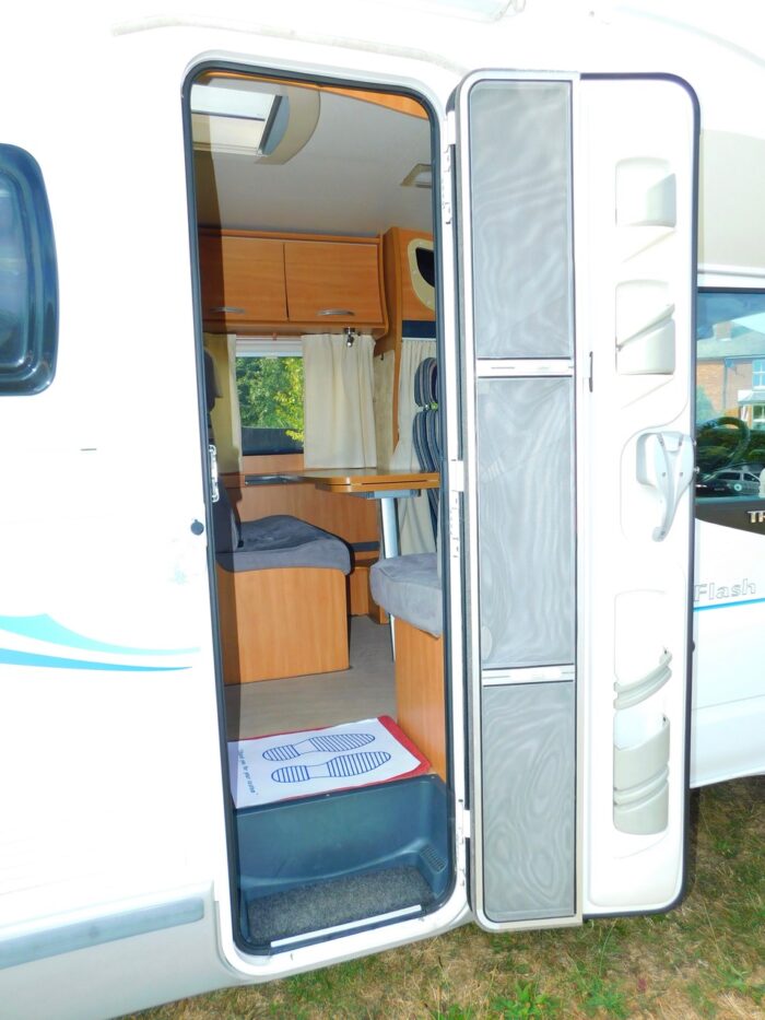Chausson Flash 14 2012 Ford 2.2 Ddci. 3 to 4 Berth with 4 x 3Point Seat Belts and Only 26,000 miles from New Complete with Cab AIR CONDITIONING, Roof Mounted Solar Panel, Large Roll Out Awning and Bike Rack Deposit Taken - Image 8