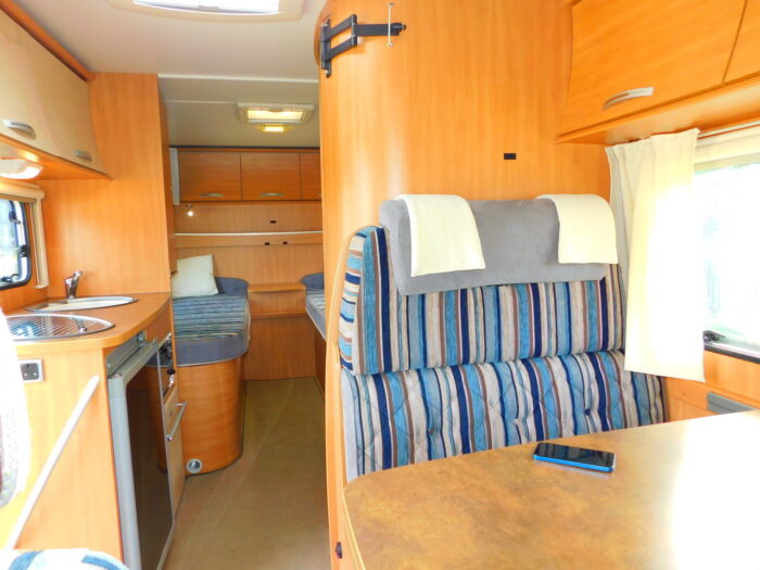 Chausson Flash 14 2012 Ford 2.2 Ddci. 3 to 4 Berth with 4 x 3Point Seat Belts and Only 26,000 miles from New Complete with Cab AIR CONDITIONING, Roof Mounted Solar Panel, Large Roll Out Awning and Bike Rack Deposit Taken - Image 4