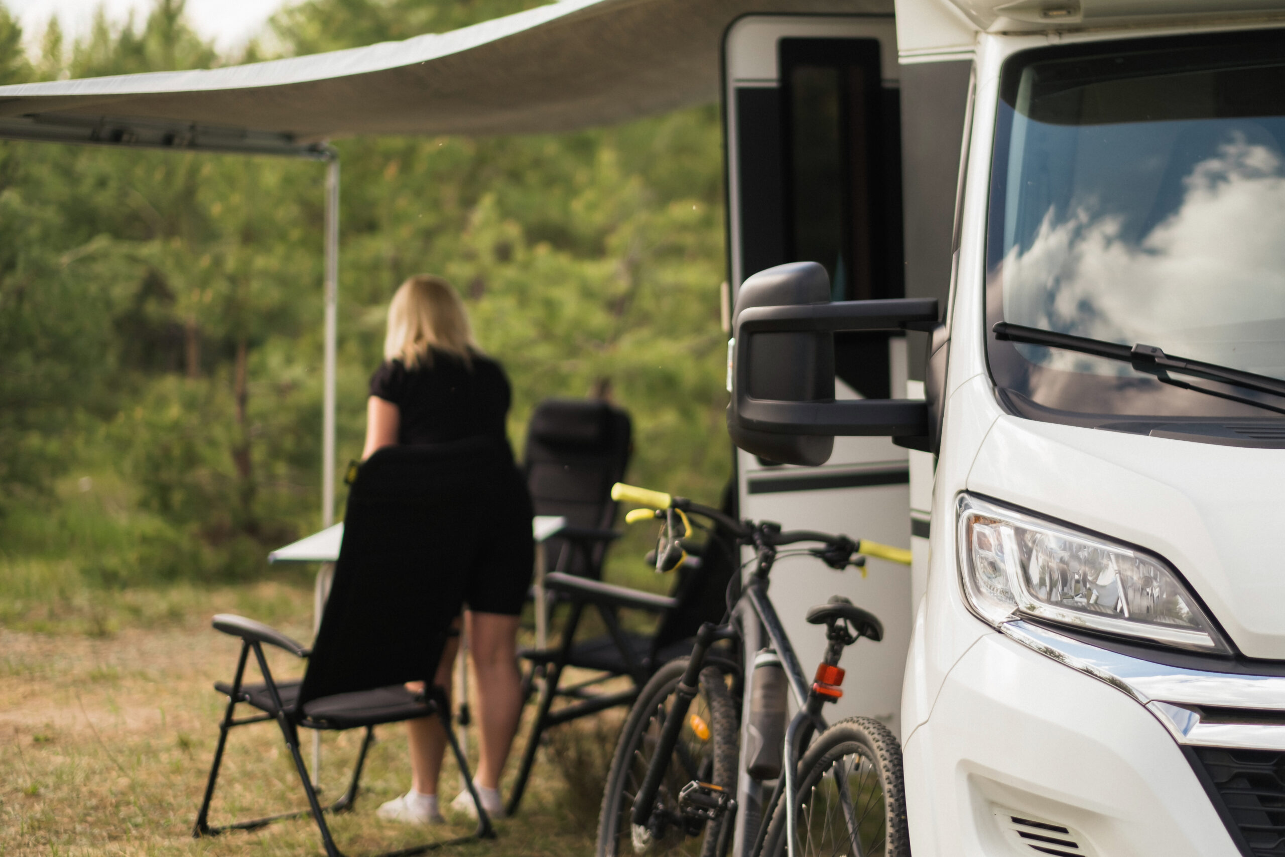 New vs Used Motorhome - chairs outside of a motorhome